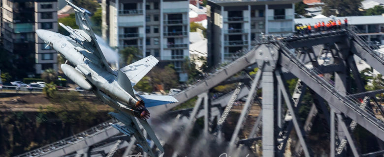 Riverfire RAAF Boeing F/A-18F Super Hornet A44-202 ripping it over the Story Bridge as workers watch on