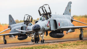 Two JASDF F-4EJ Kai's taxiing back to the display area